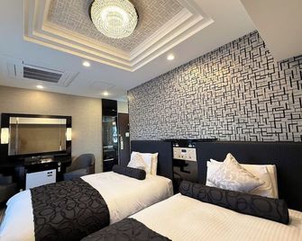 Apa Hotel Kagoshima Chuoekimae Nishiguchi - Kagoshima - Bedroom