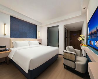 Kyriad Marvelous Hotel Changsha Wuyi Plaza Xiangya - Changsha - Bedroom