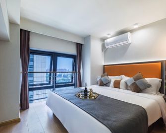 Yunyou High-end LOFT Audio and Video Apartment (Dongjiao Memory University of Technology Branch) - Chengdu - Sypialnia