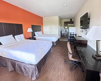 Westwood Inn and Suites - Gonzales - Bedroom