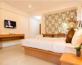 Palmari boutique hotel - קראבי - חדר שינה