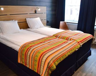 Hotell Stortorget - Östersund - Bedroom