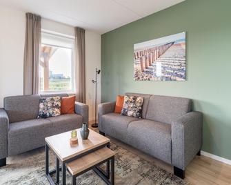 Holiday home near beach with garden - Scherpenisse - Sala de estar