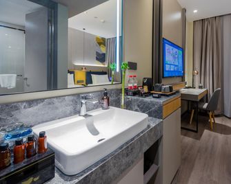 Home Inn Style Yangzhou Wanda Plaza Grand Canal Museum - האנגז'ו - חדר שינה