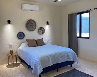 Spacious 4-bedroom, 2 house property w/ private courtyard in beautiful Chuburná - Progreso - Bedroom