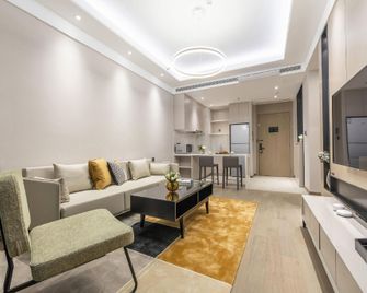 Zhonghai Haitang Serviced Apartment (Suzhou Olympic Stadium) - Suzhou - Sala de estar