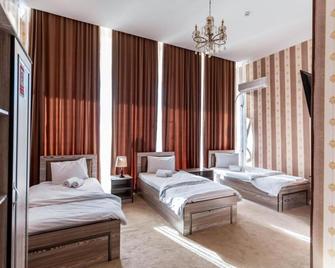 Garden Plaza Hotel - Navoiy - Bedroom