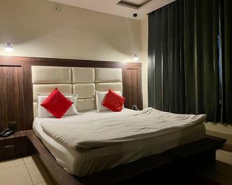 Hotel Himgiri - Jammu - Slaapkamer