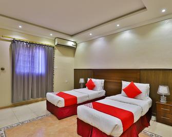 OYO 273 Star Yanbu Hotel Suites - Yanbu - Bedroom
