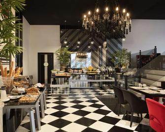 رامادا هوتل آند سويتس باي ويندام إسطنبول سيسلي - اسطنبول - مطعم