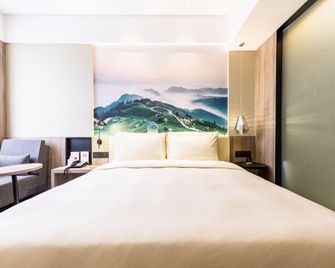 Venus International Hotel Guangxi Liuzhou High-Speed Railway Station Yufengshan Park - Liuzhou - Bedroom