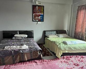 OYO 90797 Napoh Motel - Kubang Pasu - Camera da letto