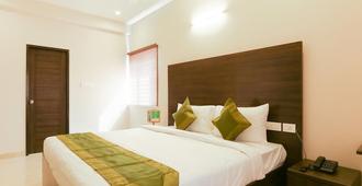 Treebo Trend Hi Line Apartments - Coimbatore - Bedroom