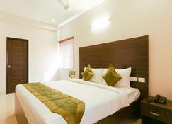 Treebo Trend Hi Line Apartments - Coimbatore - Bedroom