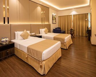 Goldfinch Hotel Bangalore - באנגאלור - חדר שינה