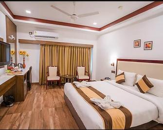 Hotel Aroma Residency - Tinsukia - Bedroom