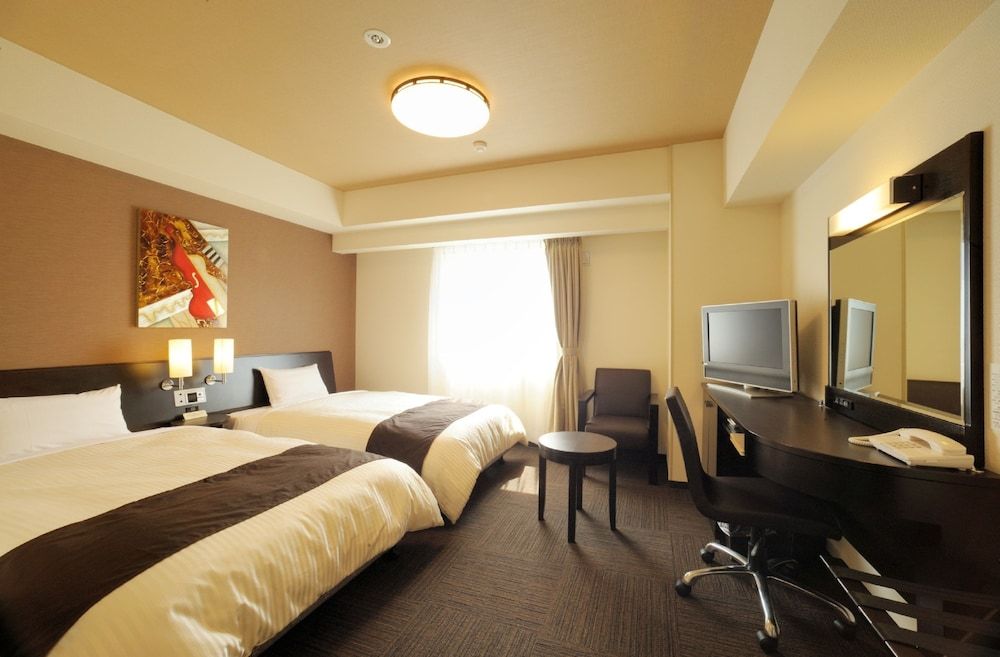 Hotel Route-Inn Sendainagamachi Inter - סנדאי - חדר שינה