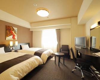 Hotel Route-Inn Sendainagamachi Inter - Sendai - Bedroom