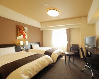 Hotel Route-Inn Sendainagamachi Inter - סנדאי - חדר שינה