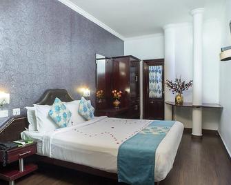 Great Escapes Resorts - Munnar - Yatak Odası