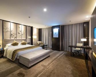 Foreman Apartment Hotel Taishan - Tai'an - Habitación