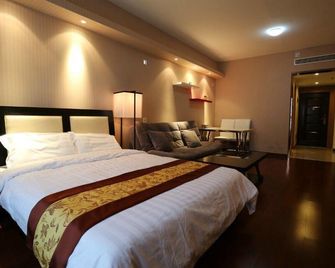 Xianglishe Apartment Hotel - تشينغداو - غرفة نوم