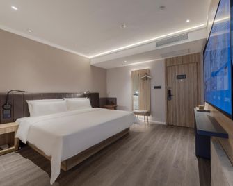 Hanting Premium Hotel Ankang Middle Xingan Road - Ankang - Bedroom
