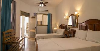 Blueroom & Hostal Sunrise - Cienfuegos - Bedroom