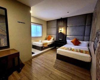Dy Viajero Transient Hotel - Naga - Camera da letto