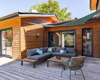 Villa familiale 10 pers. à Biscarrosse avec piscine chauffée, près du lac et des pistes cyclables - FR-1-319-488 - Biscarosse - Innenhof