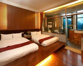 Dongpo Ti Lun Hotel - Xinyi Township - Bedroom