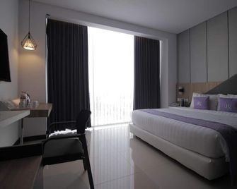 Forriz Hotel Yogyakarta - Yogyakarta - Bedroom