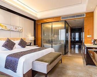 New Century Grand Hotel Siyang - Suqian - Bedroom