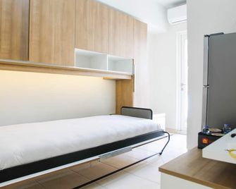 2BR with Sofa Bed at Springlake Summarecon Apartment - Bekasi - Bedroom