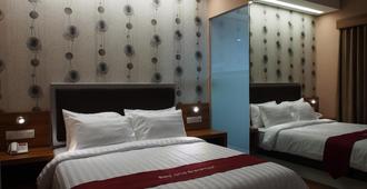 Hotel Bed and Breakfast Surabaya - Surabaya - Bedroom