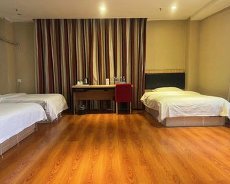 Thank Inn Hotel Anhui Suzhou Xiao County Zheshang Market - Suzhou - Bedroom