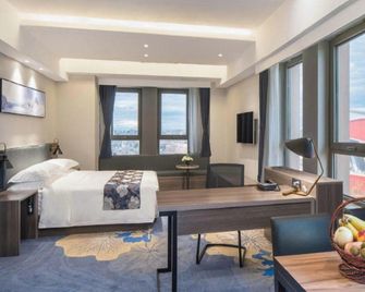 Seasons Ski Hotel - Harbin - Slaapkamer