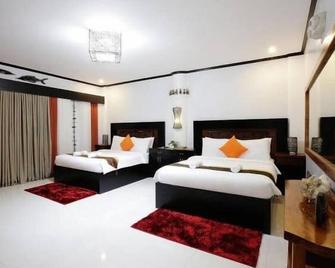 Coron Bancuang Mansion - קורון - חדר שינה