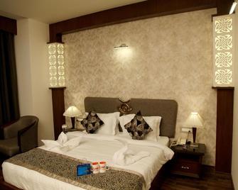 Oyo 2255 Hotel Costa River - Varanasi - Bedroom