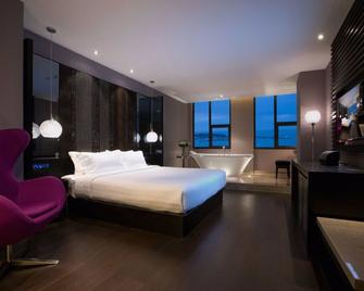 أورانج كريستال وسي سكوار سي فيو - تشينغداو - غرفة نوم