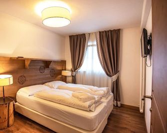 Adler Family & Wellness Clubresidence - Moena - Schlafzimmer