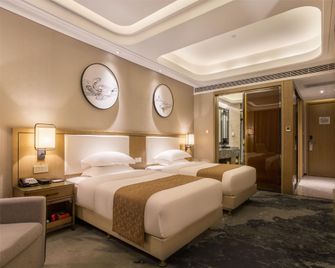 Shiyan Meisheng Holiday Hotel (Shanghai Road University Town) - Š-jen - Ložnice