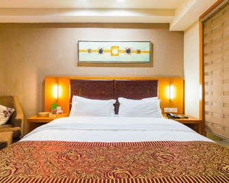 Kailai Hotel (Headquarter) - Dongying - Schlafzimmer