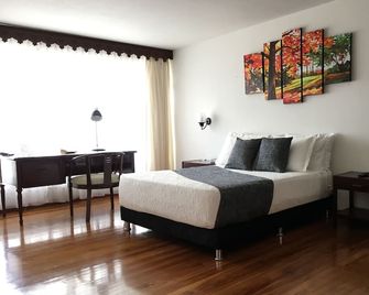 Regine's Manizales By Hoteles Confort 80 - Manizales - Bedroom
