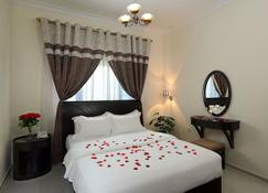 Al Smou Hotel Apartments - Ajman - Bedroom