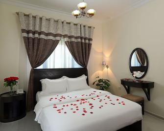 Al Smou Hotel Apartments - Ajman - Bedroom