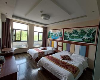 Harbin Xiangshuwan Hotel (Sun Island) - Harbin - Bedroom