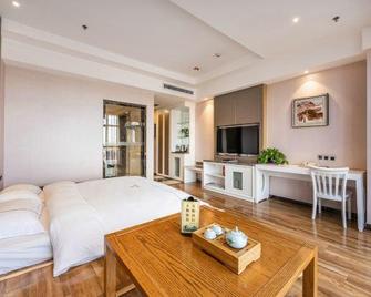 Huadong · Rongjin International Hotel - Changji - Bedroom