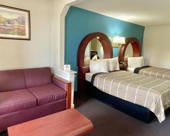Luxury Inn & Suites - Selma - Schlafzimmer