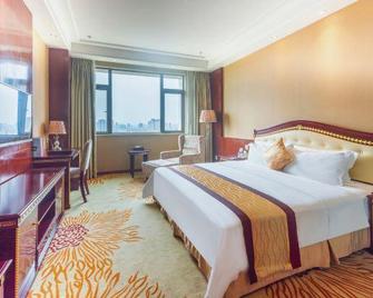 De Yang Shu Hui Grand Hotel - Deyang - Schlafzimmer